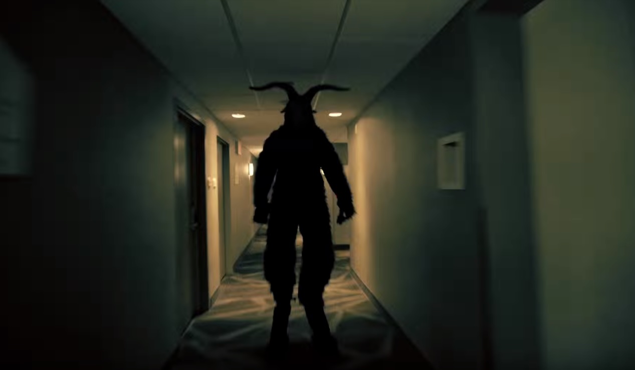 Man Walking down Corridor